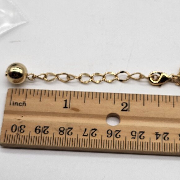 Kate Spade New York Hole Punch Cut out Gold Tone Long Necklace - Picture 11 of 12